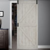 Close up of closed wooden door in the empty room with copy space