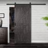 Close up of closed wooden door in the empty room with copy space