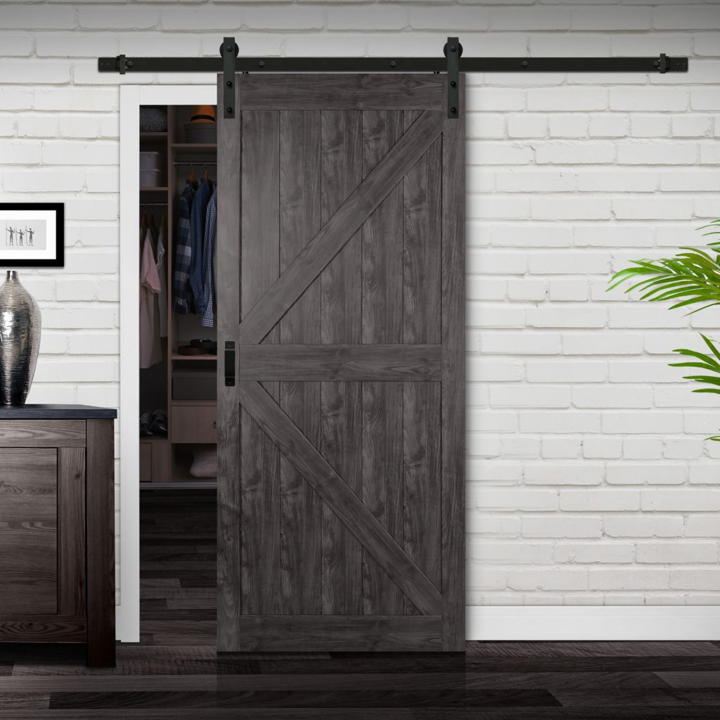 Close up of closed wooden door in the empty room with copy space