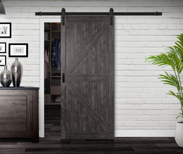 Close up of closed wooden door in the empty room with copy space