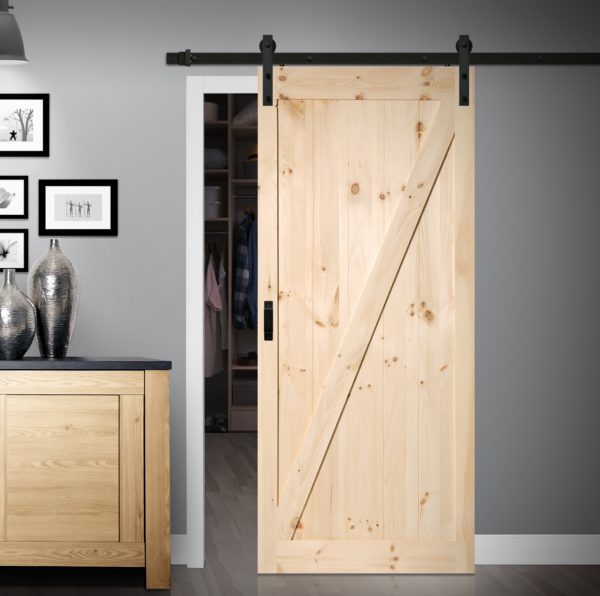 Close up of closed wooden door in the empty room with copy space