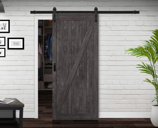 Close up of closed wooden door in the empty room with copy space