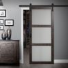Close up of closed wooden door in the empty room with copy space