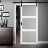 Close up of closed wooden door in the empty room with copy space